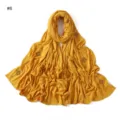 Detailed view of the yellow long scarf with elegant gold rhinestone cross details and soft fabric. - Style #8