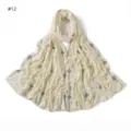 Beige cotton modal scarf detail featuring rhinestone four leaf clover lines pattern. - Off White