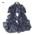 Detailed view of the blue plaid chiffon scarf, lightweight fabric and delicate drape. - Style 14