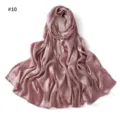 Detailed view of the elegant satin long scarf featuring a subtle jacquard pattern. - Style #10
