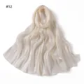 Detailed view of the shiny satin long scarf, featuring a soft draped crinkle texture for summer. - Style 12