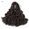 Detailed view of brown crinkled slub cotton scarf with frayed edges and fine texture. - Dark Brown