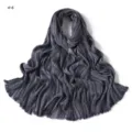 Detailed view of dark grey striped crinkled scarf texture, soft fringe edge fabric. - Polka Dot (#4)