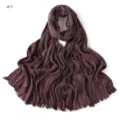 Detailed view of the dark purple pleated fringe scarf, showing fine texture and soft fabric. - #7