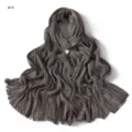 Detailed view of the soft pleated fringe scarf, showing fine texture and striped pattern. - Style #9