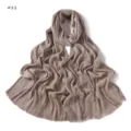 Detail view of a soft pleated fringe long scarf shawl in khaki, textured crinkle design. - Style #11