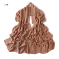 Detailed view of a elegant beige chiffon scarf with sparkling rhinestones and rose pattern. - Code 27