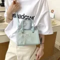 Women light blue shoulder crossbody bag, stylish small square handbag with pearl bow. - Pendant Included / Blue