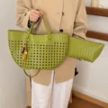 Green woven leather tote bag with matching wristlet pouch and wooden bead charm variant - With Pendant / Green