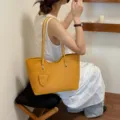 Borsa shopper intrecciata gialla da donna, elegante borsa a spalla in pelle PU quotidiana. - Giallo