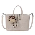 Woven dumpling bag for women, stylish crossbody handbag with cute bear keychain for daily commute. - White