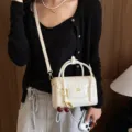 Stylish white crocodile texture crossbody handbag with cherry charm, versatile daily purse. - Off White