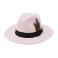 Pink felt fedora hat detail, featuring black ribbon and decorative feather design. - 58cm / Pink