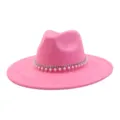 Close-up detail of the pink suede fedora hat, featuring elegant rhinestone and pearl band. - 58cm / Barbie Pink