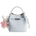 Light blue leather bucket bag women stylish handbag with cute rabbit plush keychain charm. - Blue with Charm