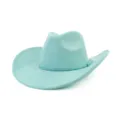 Close-up view of turquoise suede cowboy hat detail, showing soft texture and braided band. - Mint Green