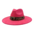 Close-up detail of the pink wide brim fedora hat featuring ethnic embroidery and vintage buckle. - 58cm / Rose Red
