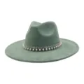 Close-up detail of the green suede fedora hat showcasing rhinestone and pearl tassel band. - 58cm / Pickle Green
