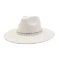 Detailed view of white fedora hat featuring sparkling rhinestone and elegant pearl trim band. - 58cm / Cream