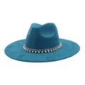 Close-up detail of the wide-brim suede jazz hat featuring an elegant pearl and rhinestone band. - 58cm / Peacock Dark Blue