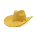 Yellow suede cowboy hat detail showing soft fabric texture and woven braided hatband. - Turmeric