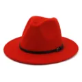 Close-up detail of the elegant red fedora hat with a sleek black leather belt and metal buckle. - 58cm / Orange