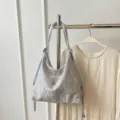 Stylish silver butterfly tote bag, versatile convertible hobo backpack for women daily commute. - Silver