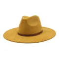 Detailed view of the yellow suede fedora hat showcasing its stylish geometric patterned band. - M (56-58cm) / Turmeric