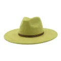 Detailed view of the light green suede fedora hat featuring a stylish brown geometric band. - M (56-58cm) / Avocado Green