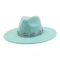 Close-up of turquoise fedora hat featuring silver concho chain band with faux turquoise stones. - 58cm / Mint Green
