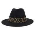 Black fedora hat detail showing leopard print band and wide wool brim closeup. - Black