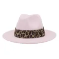 Detailed view of the pink felt fedora hat featuring a stylish leopard print band accent. - Pink