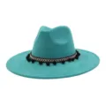 Turquoise suede fedora hat detail, elegant boho black pom-pom band trim, chic wide brim. - Peacock Light Blue