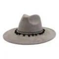 Grey suede fedora hat with ethnic black woven pom pom band for men and women detail view - Charcoal Grey