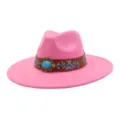 Stylish pink suede fedora hat featuring a turquoise metal buckle and retro embroidery detail - Barbie Pink