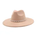 Detailed close-up of a stylish beige suede fedora hat featuring a sparkling pearl rhinestone flower band. - M (56-58cm) / Champagne