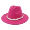 Pink felt fedora hat detail featuring an elegant white pearl and beaded trim band design. - Rose Red