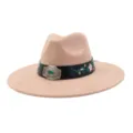 Close-up detail view of the exquisite floral embroidered black band and vintage silver buckle. - 58cm / Champagne