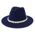 Detailed view of the elegant navy blue wool fedora hat with pearls and beads details. - Navy Blue