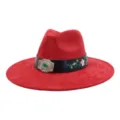 Close-up of red suede wide-brim fedora hat featuring an embroidered black band and silver buckle. - 58cm / Burgundy