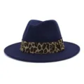 Detailed view of dark blue wool fedora hat with trendy leopard print band, premium finish. - Navy Blue