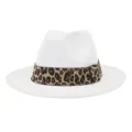 White wool fedora hat detail, elegant leopard print band, classic wide brim winter fashion. - White