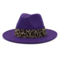 Detailed view of the purple wool fedora hat featuring a stylish leopard print band. - Purple