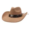 Close-up detail of the retro suede cowboy hat with dark leather skull band and metal studs. - Camel
