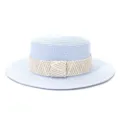 Flat top straw hat detail featuring light blue woven straw and a patterned beige band. - 58cm / Sky Blue