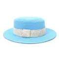 Detailed close-up of light blue flat top straw hat with textured woven ribbon band. - 58cm / Lake Blue
