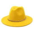 Detail view of a stylish yellow wool fedora hat featuring a chic gold chain accent trim. - 58cm / Yellow