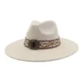 Detailed view of wide brim beige fedora hat with ethnic embroidery and amber buckle. - 58cm / Beige