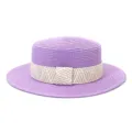 Detailed close-up view of a stylish purple straw boater hat with a chic woven band. - 58cm / Light Purple