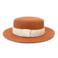Detail view of the stylish woven straw boater hat, featuring a contrast chevron ribbon band. - 58cm / Caramel color
